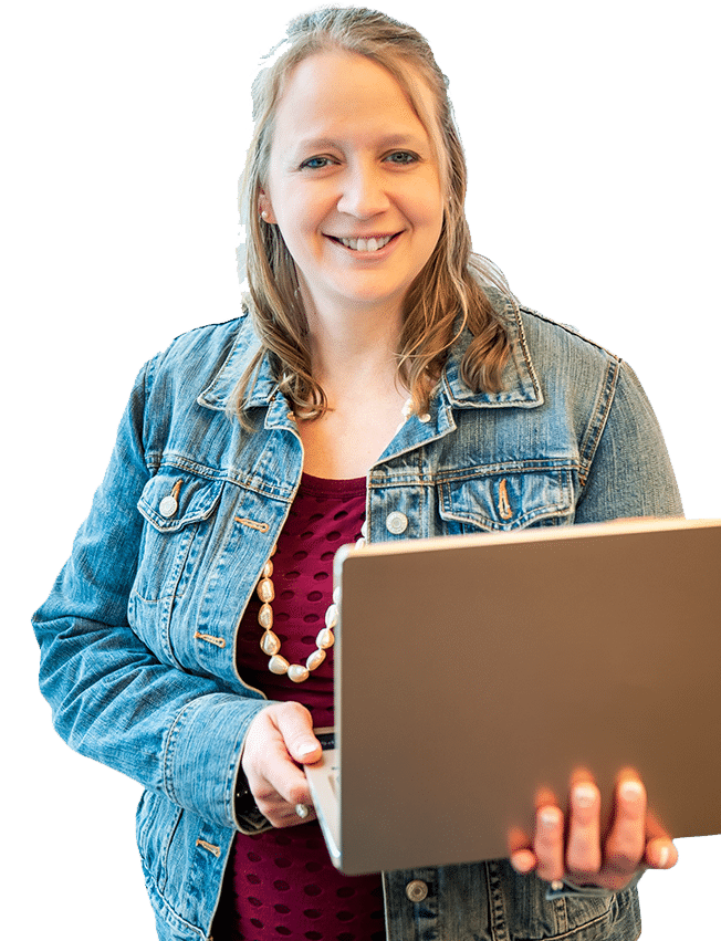 lori kendall holding a laptop